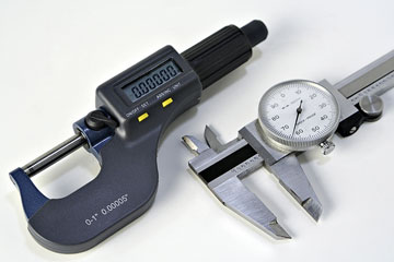 caliper and micrometer tools used by tool and die makers