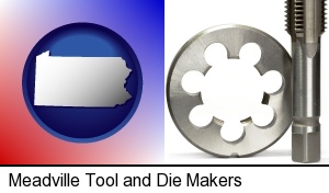 Meadville, Pennsylvania - a metal die and a screw tap, isolated on a white background