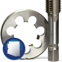 arizona a metal die and a screw tap, isolated on a white background