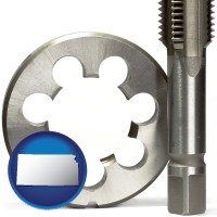 kansas a metal die and a screw tap, isolated on a white background
