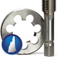 new-hampshire a metal die and a screw tap, isolated on a white background