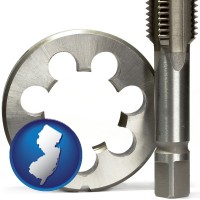new-jersey map icon and a metal die and a screw tap, isolated on a white background