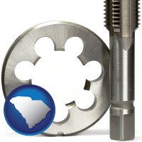 south-carolina map icon and a metal die and a screw tap, isolated on a white background