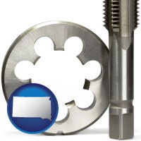 south-dakota map icon and a metal die and a screw tap, isolated on a white background