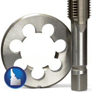 a metal die and a screw tap, isolated on a white background - with Idaho icon