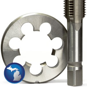 a metal die and a screw tap, isolated on a white background - with Michigan icon