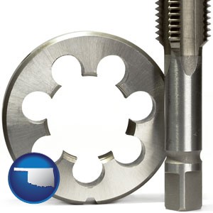 a metal die and a screw tap, isolated on a white background - with Oklahoma icon