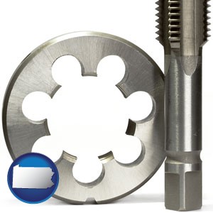 a metal die and a screw tap, isolated on a white background - with Pennsylvania icon