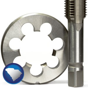 a metal die and a screw tap, isolated on a white background - with South Carolina icon
