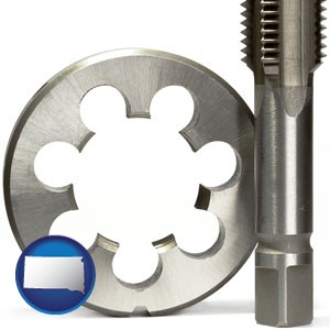 a metal die and a screw tap, isolated on a white background - with South Dakota icon
